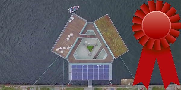 Video Screenshot: København fra Luften [Copenhagen from the Air] by Aaron Hathaway with a red ribbon to indicate an honorable mention award