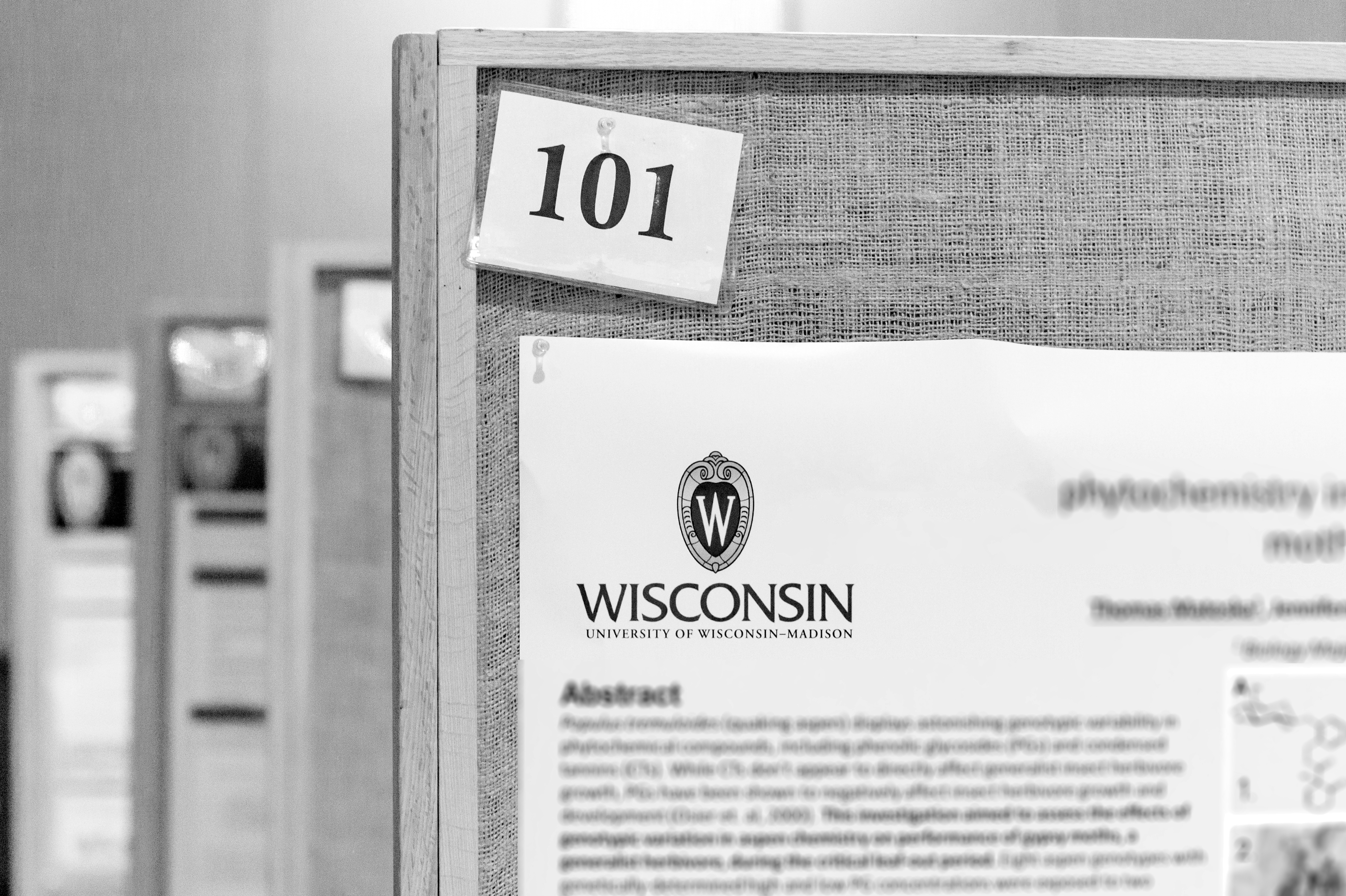Black and White photo of a poster session from UW-Madison